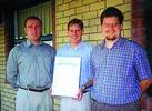 Pictured (from left to right) are: Derick Moolman, Marc van Olst and Francois du Plessis holding the SABS award